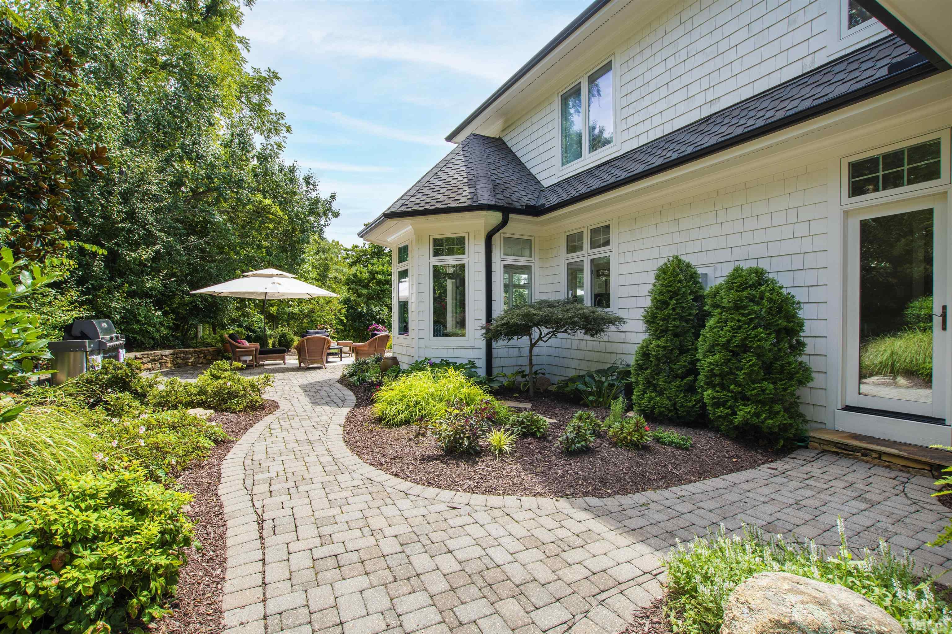 Paved stone access to rear patio.