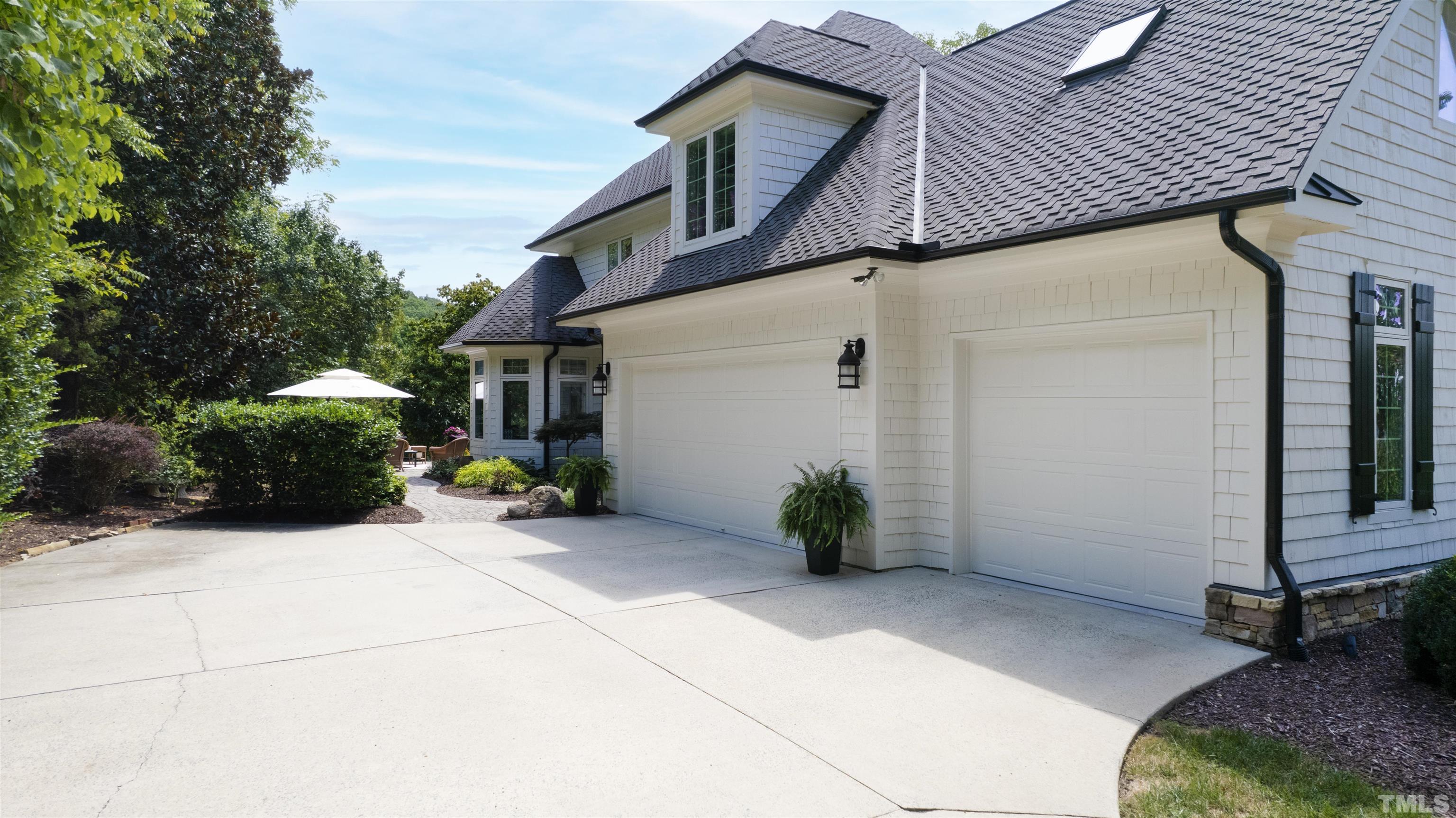 The home features a three-car garage as well.
